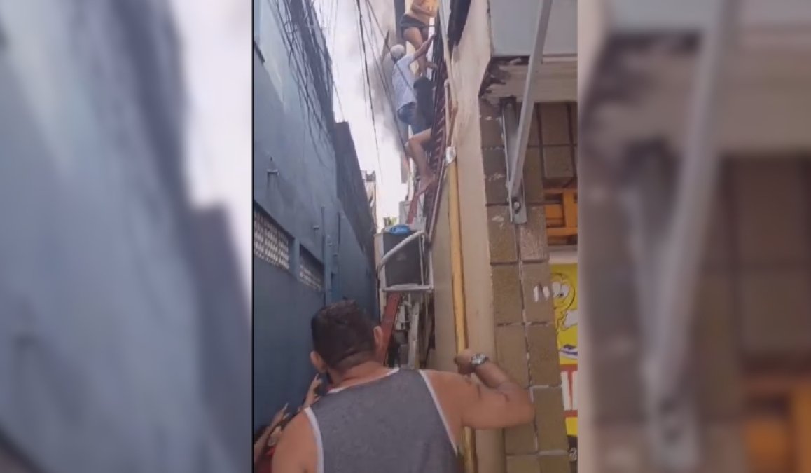 VÍDEO: vizinhos resgatam moradores por sacada em incêndio no Praça 14